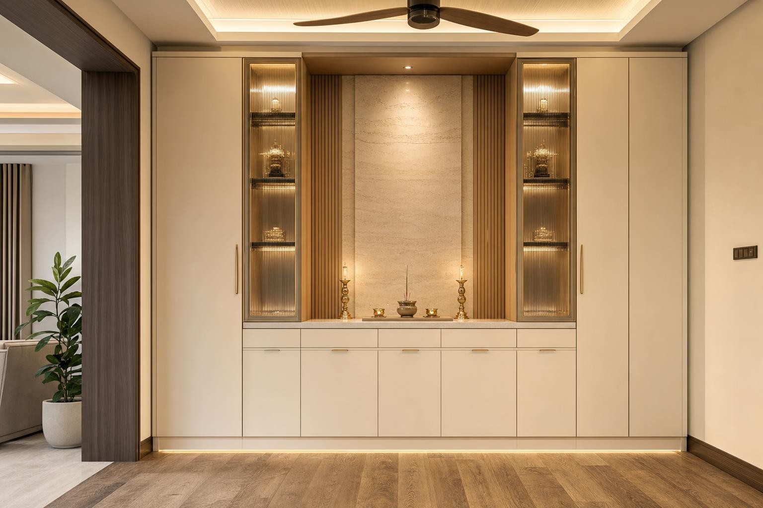 Cream Luxury · Altar cabinet · Full-height built-in altar cabinet with recessed stone-clad niche, fluted timber reveals and concealed downlight, raised offering counter over a flush